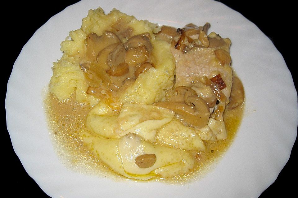 Putenschnitzel mit Champignonkruste