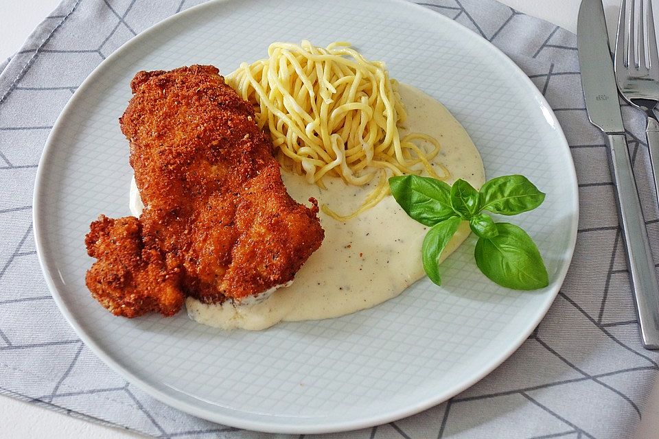 Panierte Schnitzel mit Gorgonzolasauce