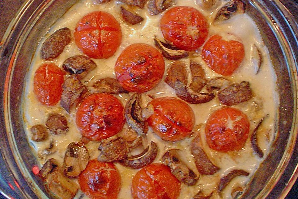 Filetauflauf mit Champignons und  Tomaten