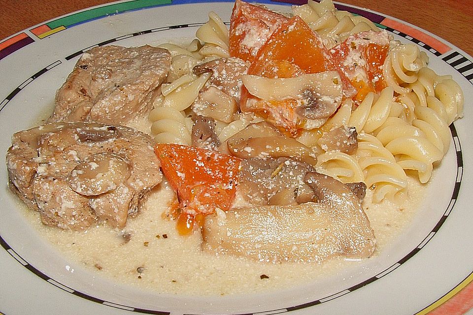 Filetauflauf mit Champignons und  Tomaten