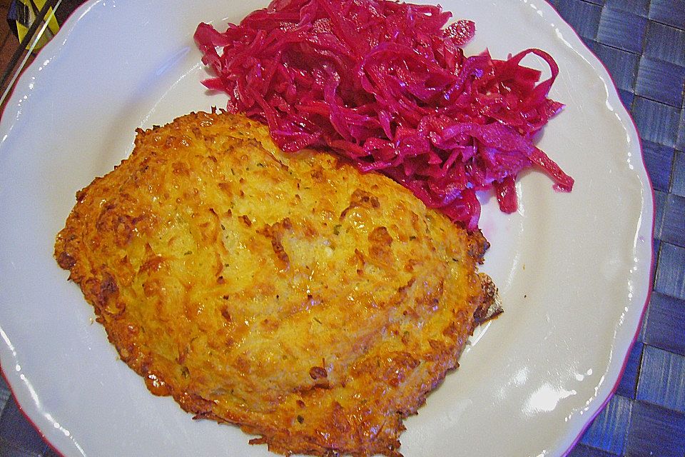 Schweinesteak im Reibekuchenmantel