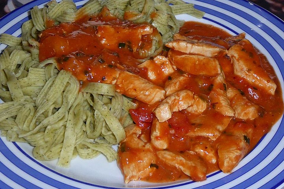 Hähnchenragout mit Tomaten - Sahne