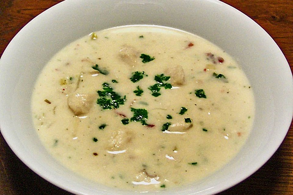 Kokossuppe mit Fisch