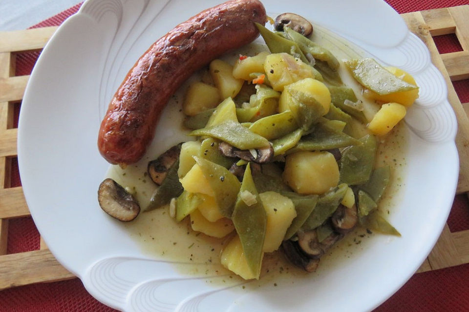 Fisolen mit Champignons