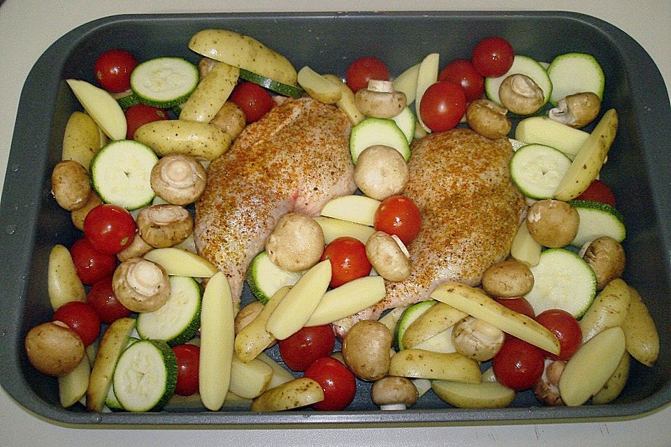 Poulet im Gemüsebeet