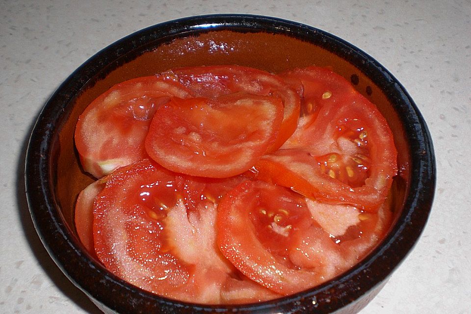 Tomaten mit Mozzarella überbacken