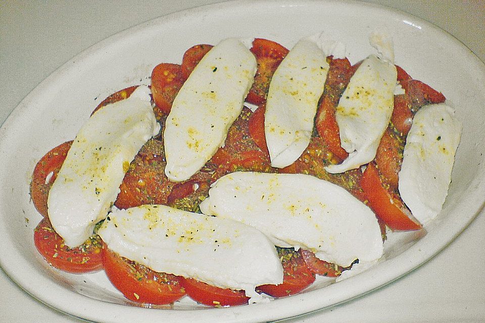 Tomaten mit Mozzarella überbacken