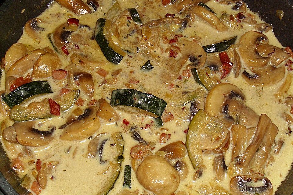 Champignons und Zucchini