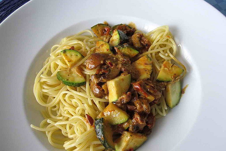 Champignons und Zucchini