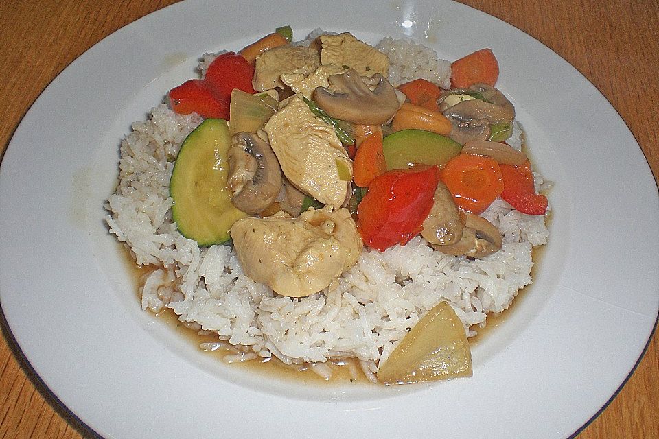 Gekochtes Hähnchen mit Cashewnüssen