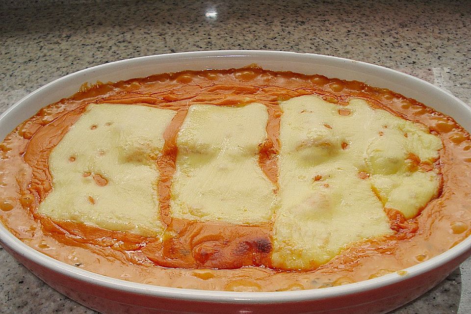 Zucchini-Schinkenröllchen überbacken