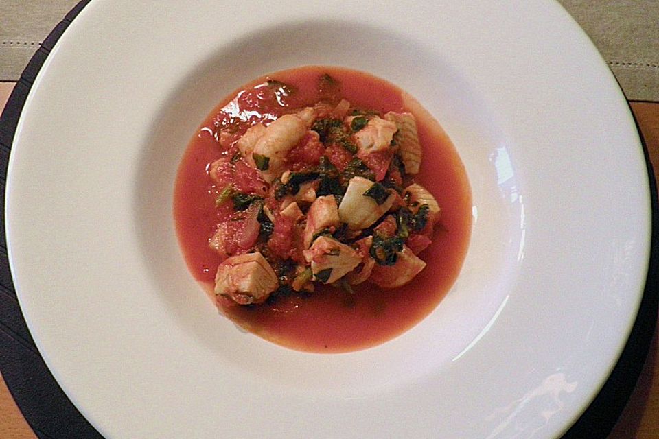 Mediterrane Fischpfanne mit Spinat