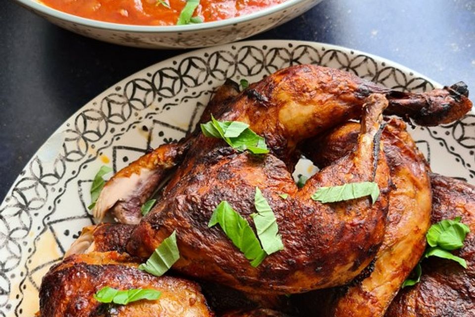 Hähnchenkeule mit Tomatensoße