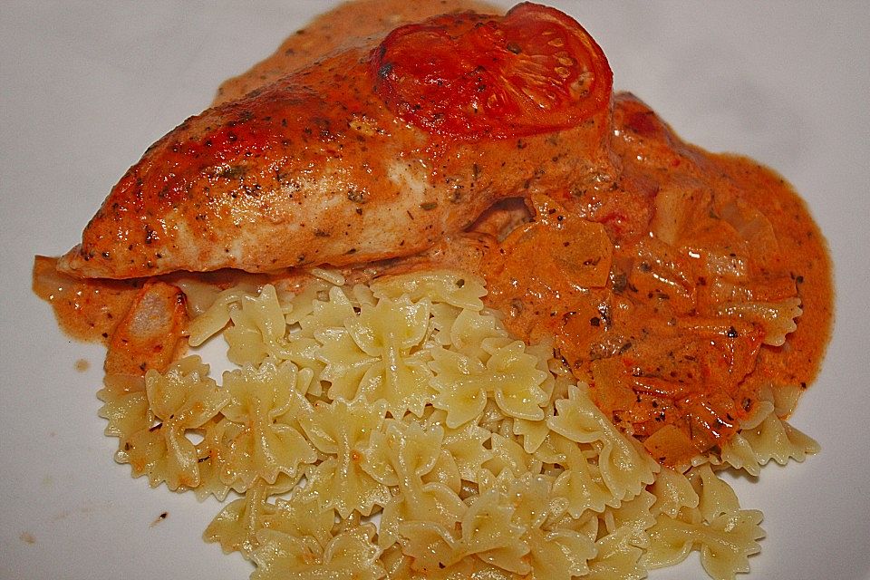 Putenschnitzel in Tomaten-Käsesoße