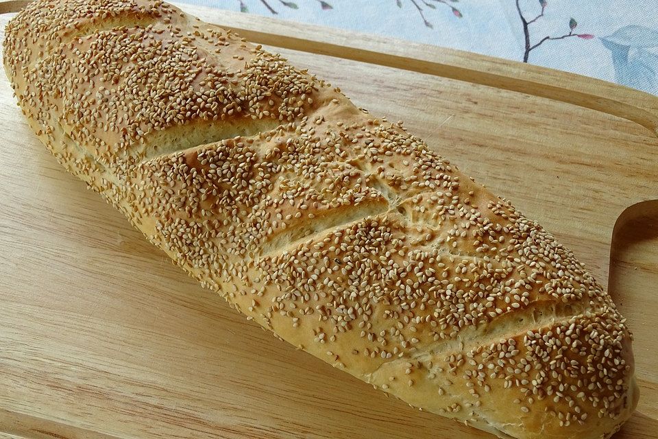 Frischkäsebrotstange mit Sesamkruste