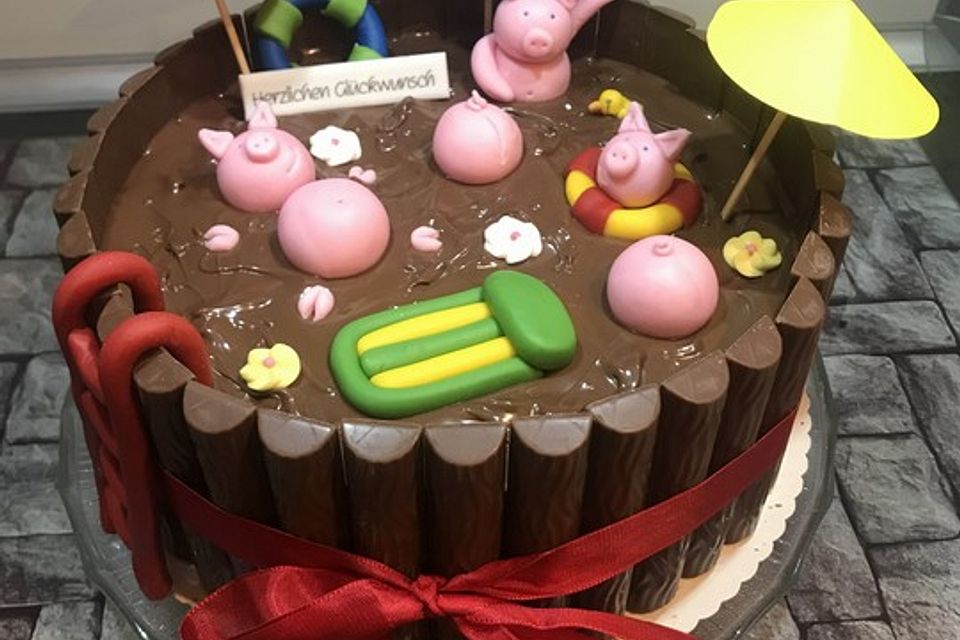 Schweinchen im Matschkübel-Torte