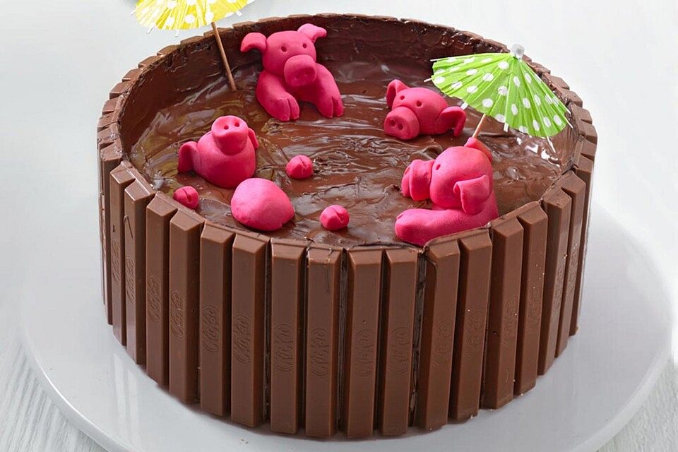 Schweinchen im Matschkübel-Torte