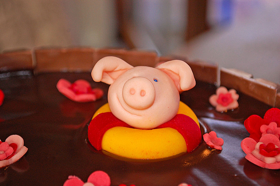 Schweinchen im Matschkübel-Torte