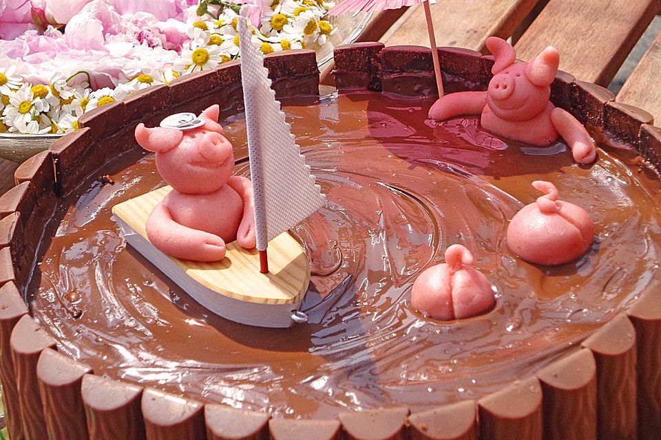 Schweinchen im Matschkübel-Torte