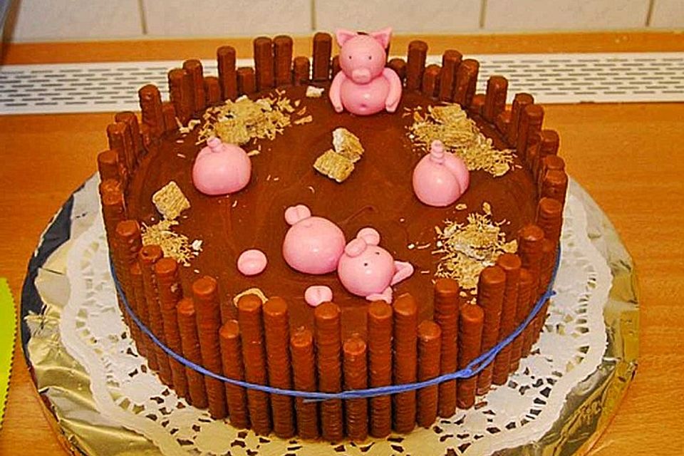 Schweinchen im Matschkübel-Torte