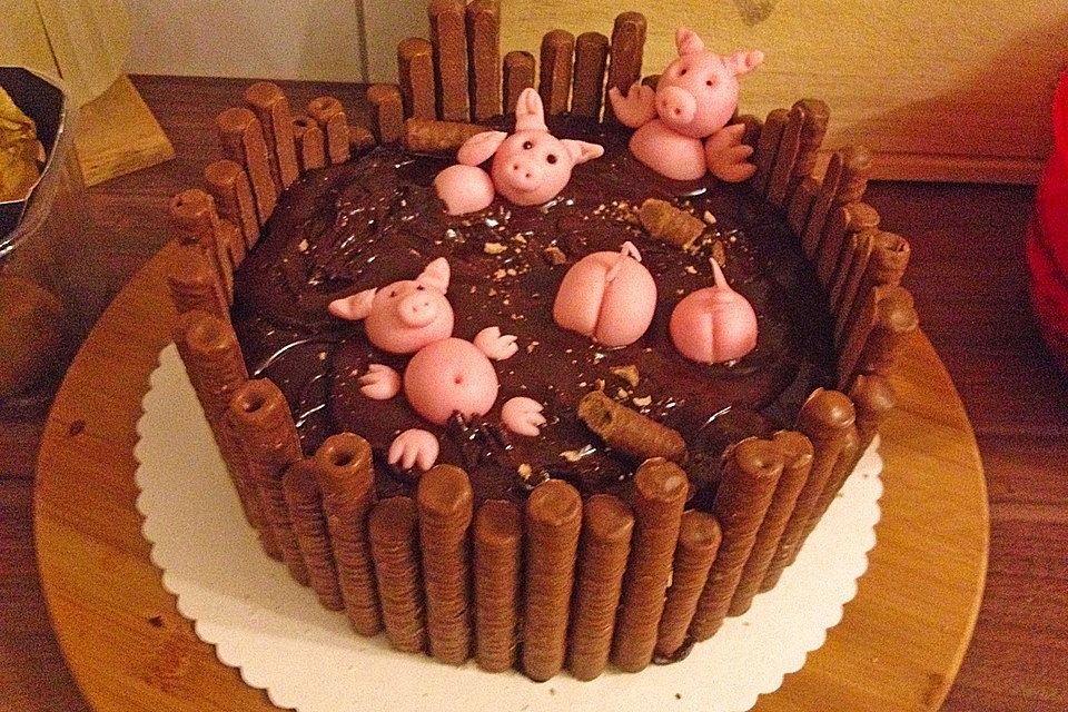 Schweinchen im Matschkübel-Torte