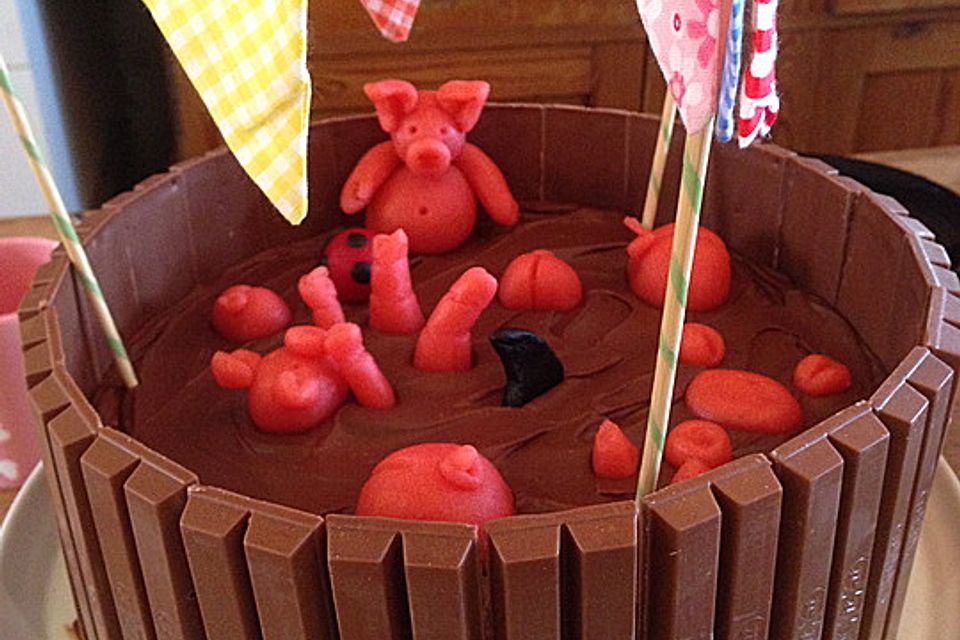 Schweinchen im Matschkübel-Torte