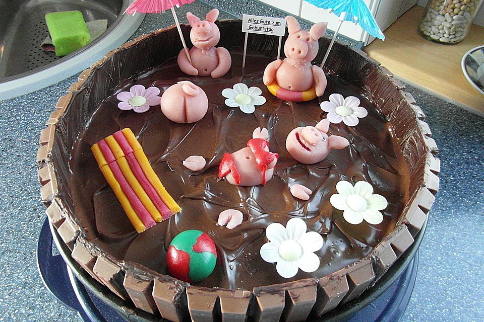 Schweinchen im Matschkübel-Torte