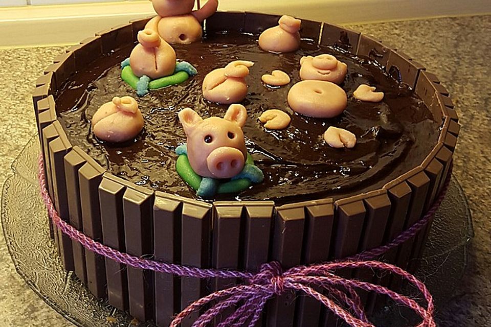 Schweinchen im Matschkübel-Torte