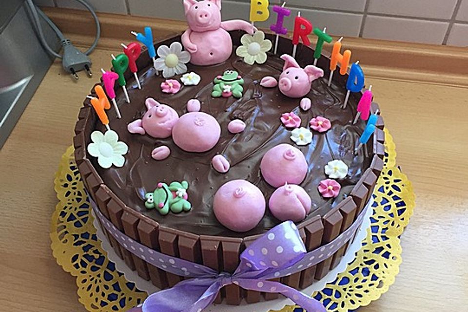 Schweinchen im Matschkübel-Torte