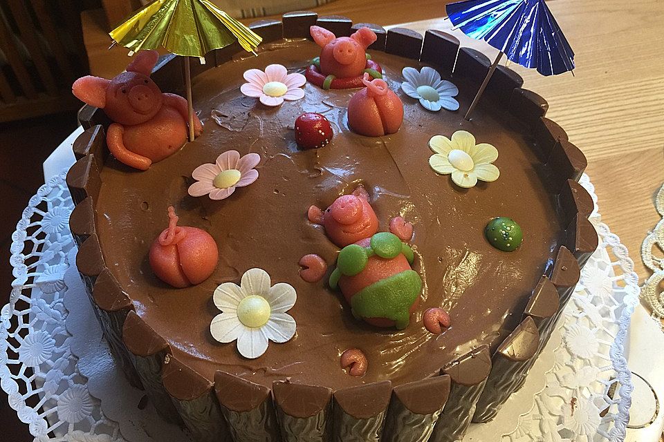 Schweinchen im Matschkübel-Torte