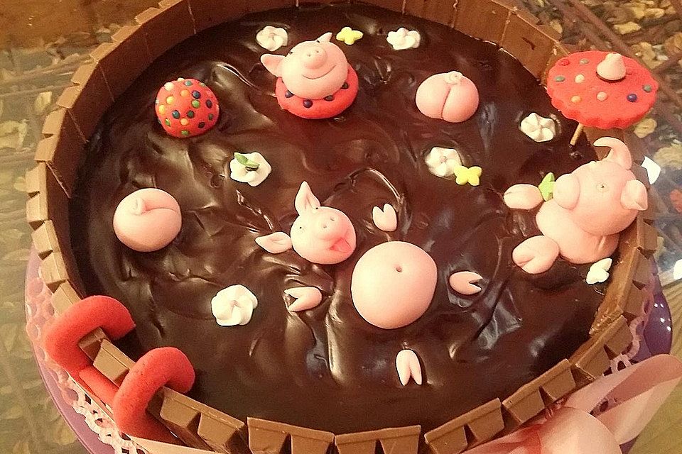 Schweinchen im Matschkübel-Torte