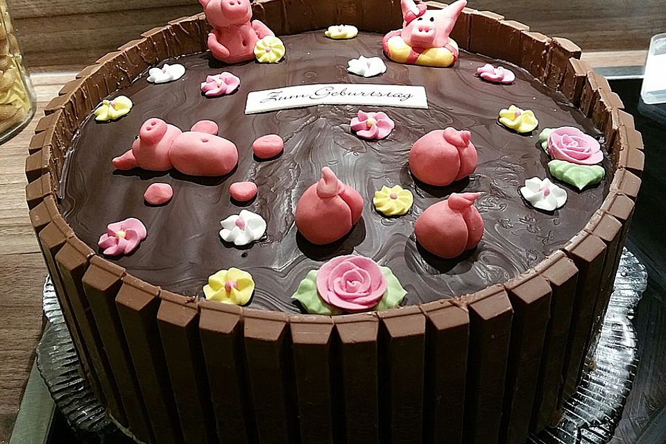 Schweinchen im Matschkübel-Torte