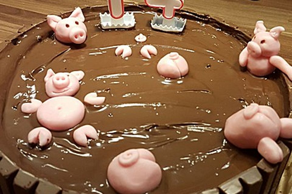 Schweinchen im Matschkübel-Torte