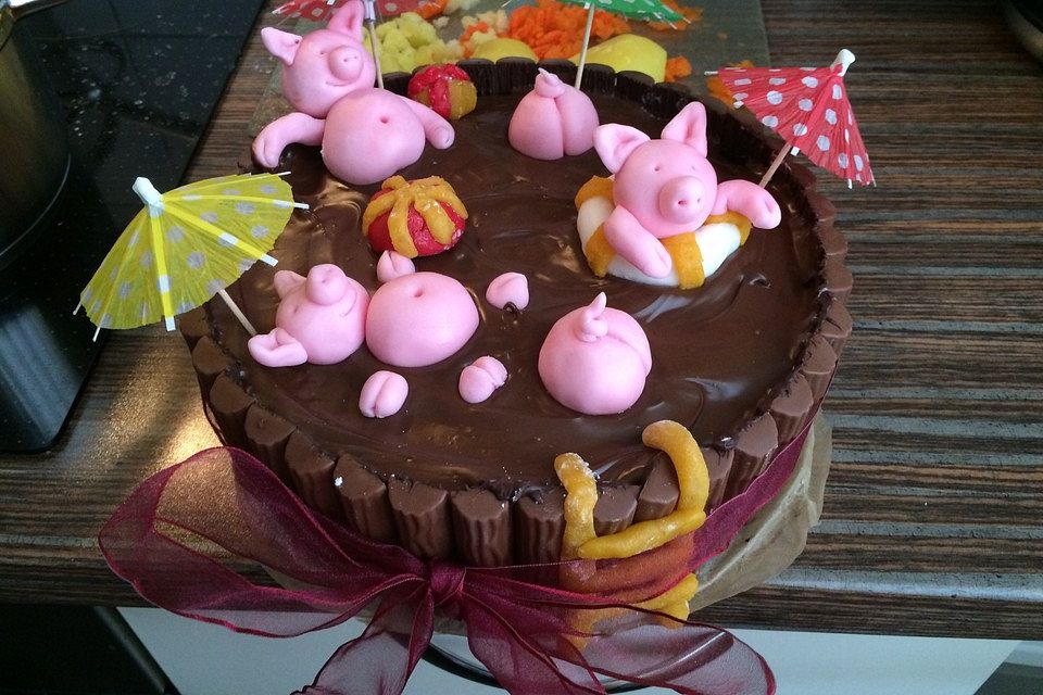 Schweinchen im Matschkübel-Torte