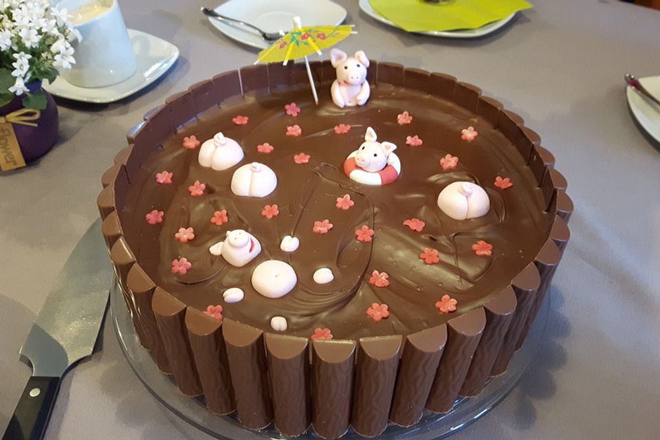 Schweinchen im Matschkübel-Torte