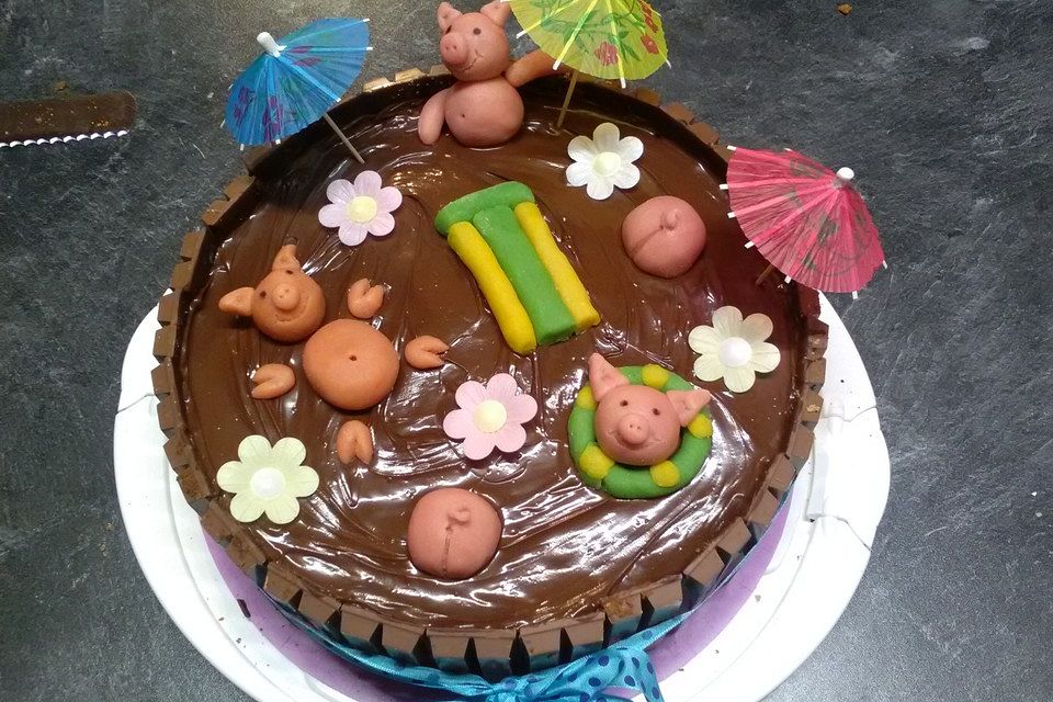 Schweinchen im Matschkübel-Torte