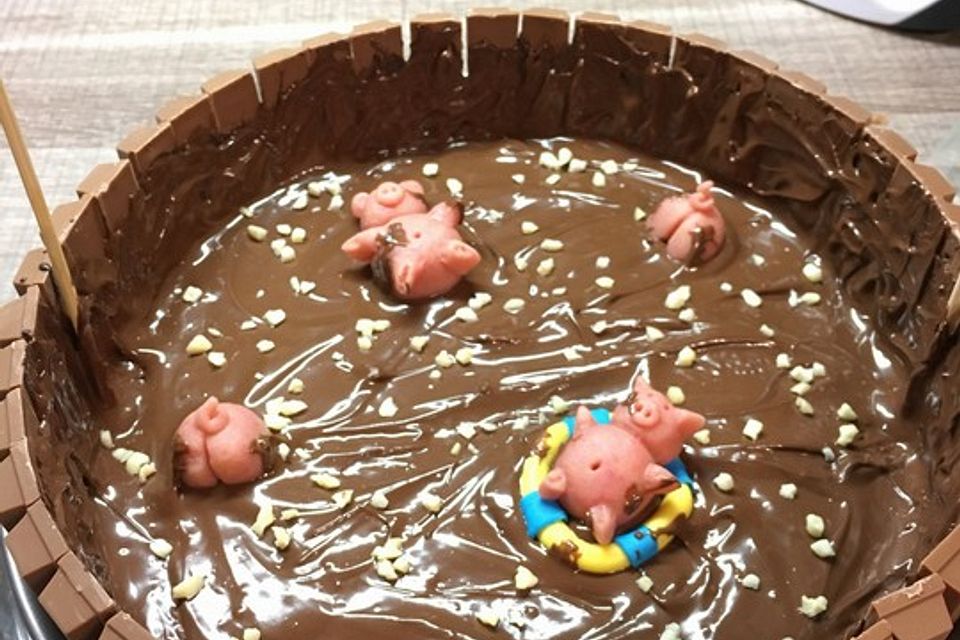 Schweinchen im Matschkübel-Torte