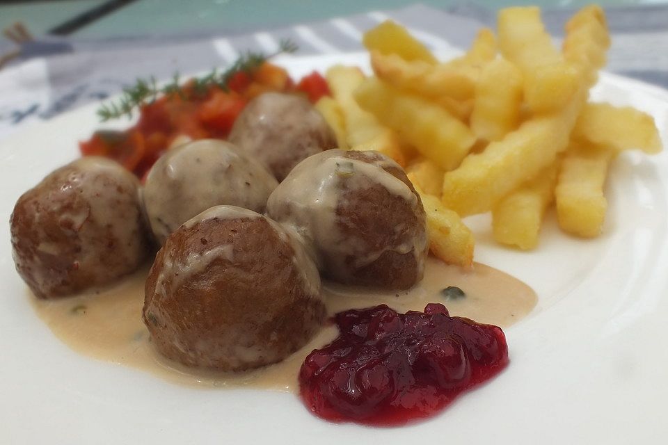 Fleischklößchen mit Sahnesoße