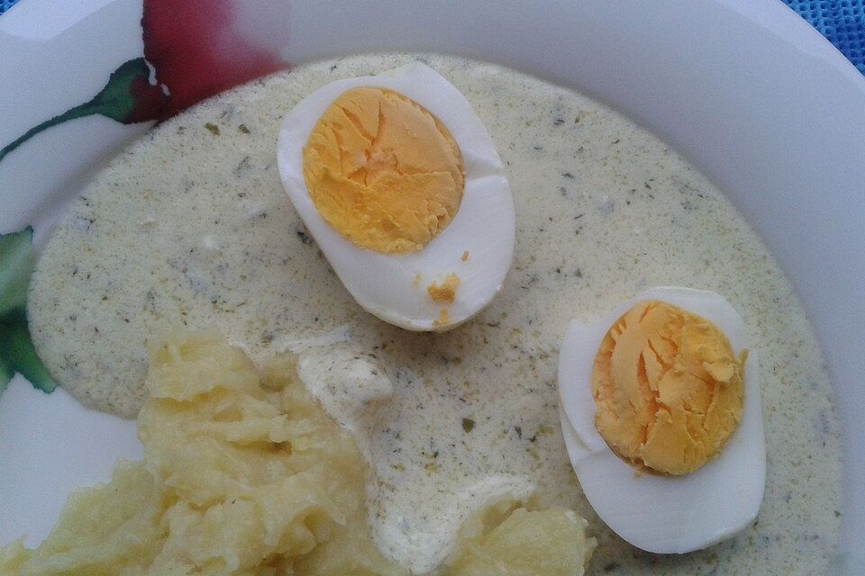 Eier in Frischkäsekräutersauce