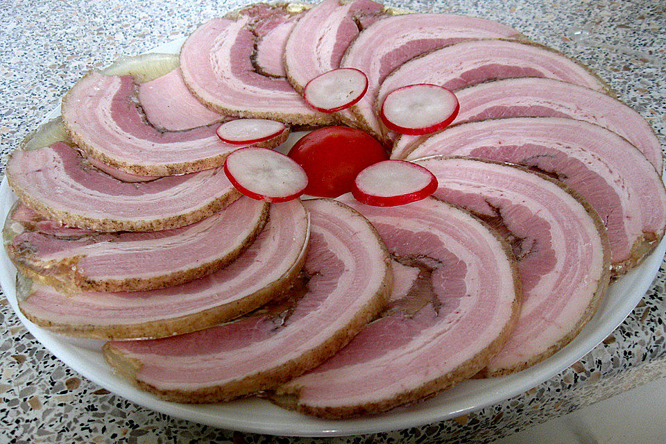 Schweinebauchrolle in Aspik