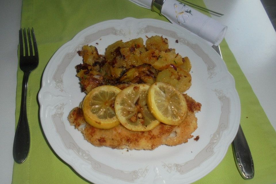 Fisch auf Zitrone gebraten