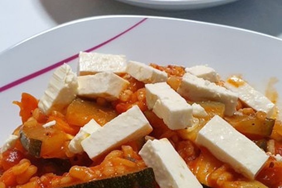 Zucchinipfanne mit Tomatenreis