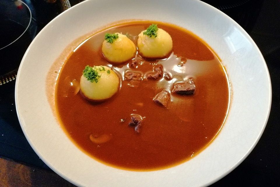 Ochsenschwanzsuppe mit Champignons