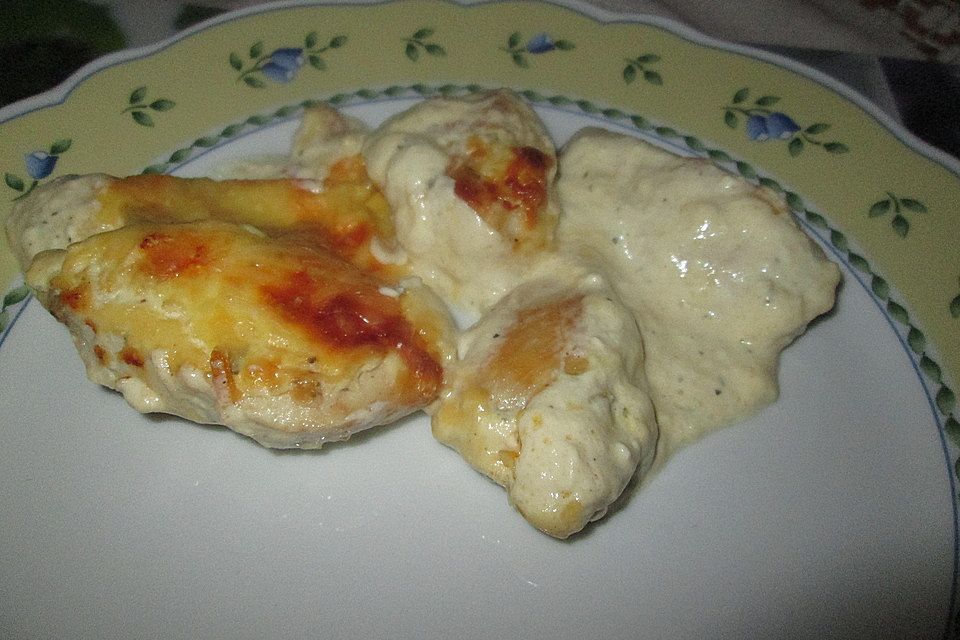 Hähnchenfilets mit Käsehaube