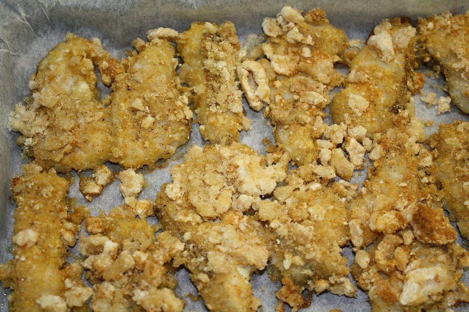 Seelachs mit Schweinekrustenchips paniert