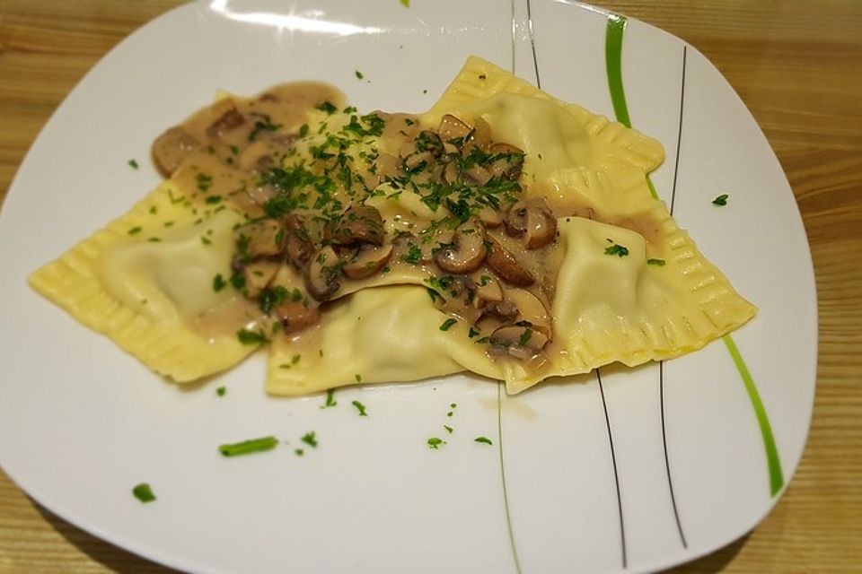 Spinat-Ravioli mit Pilzen