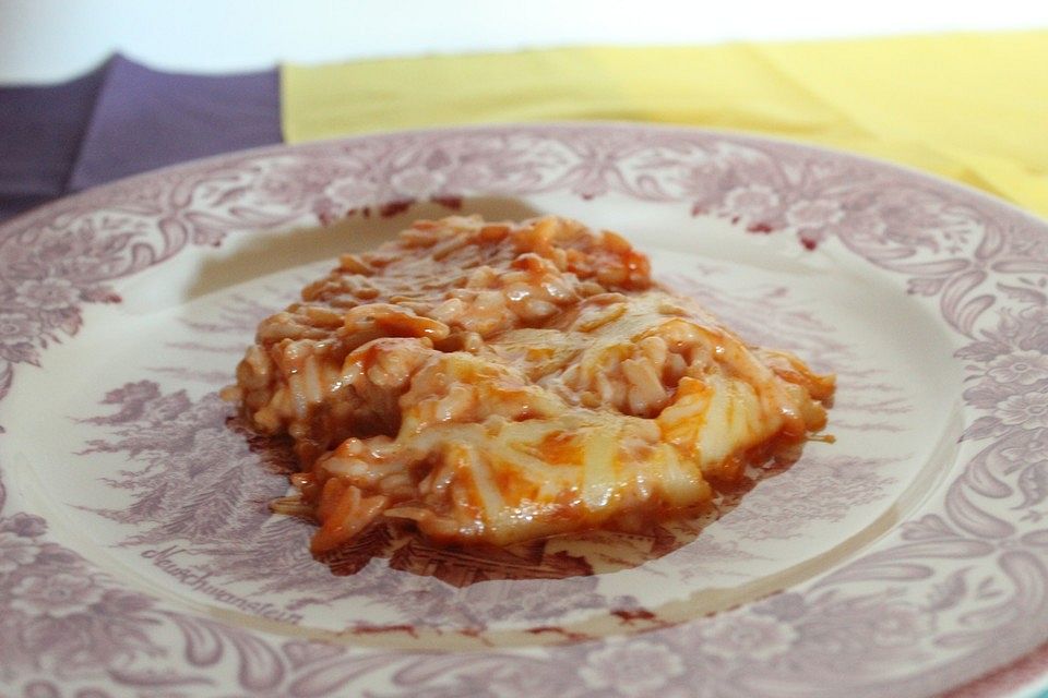 Überbackener Reis in Tomatensoße