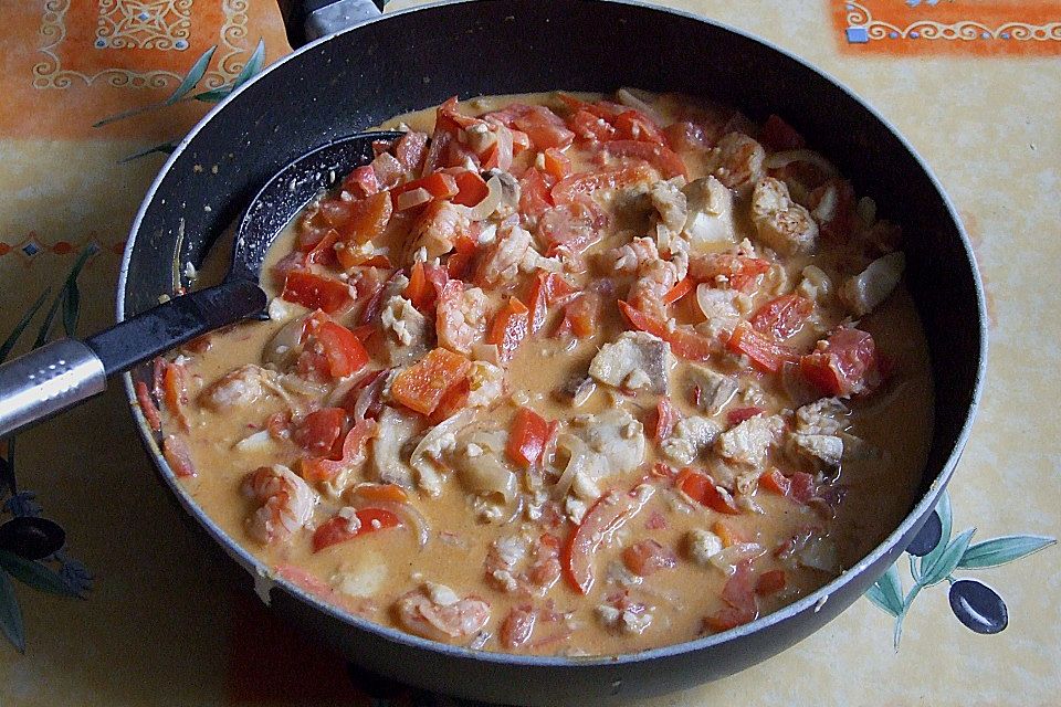 Brasilianische Fischpfanne mit Reis