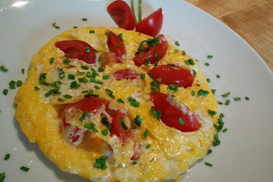 Eier mit Tomaten