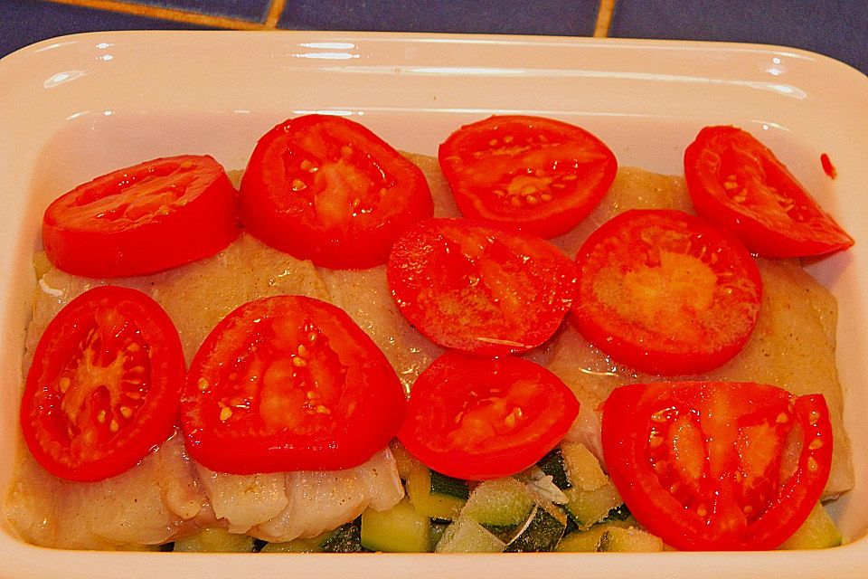 Seelachsfilet auf Zucchinibett